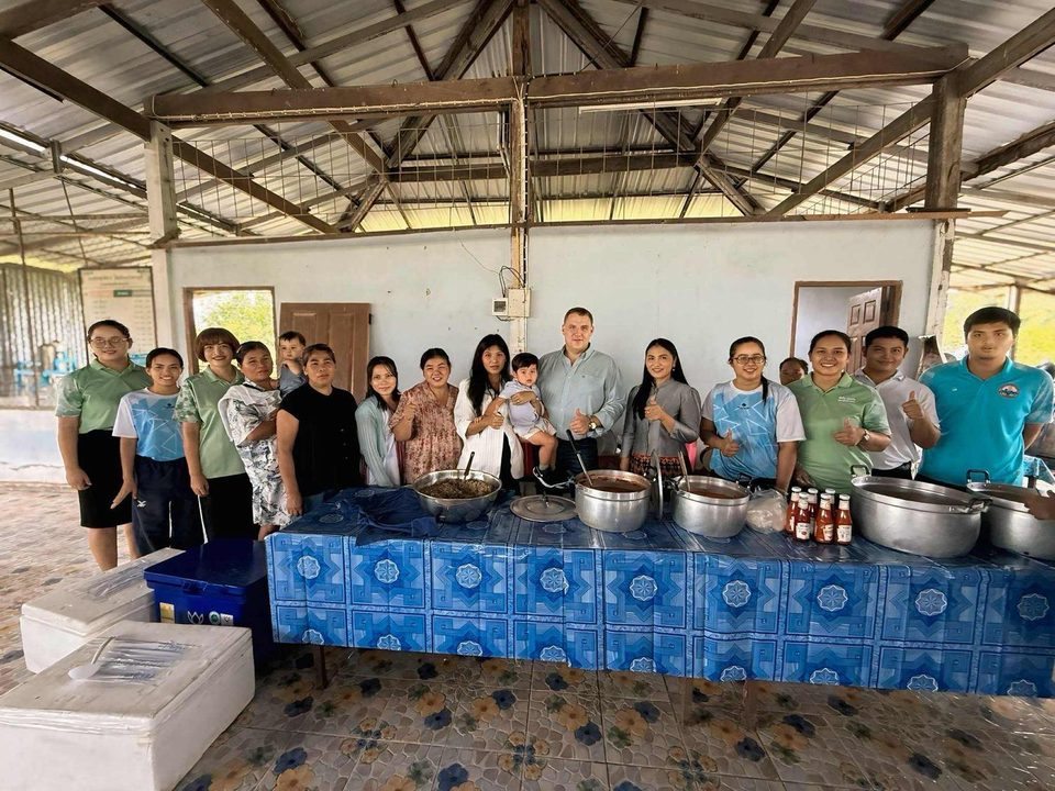 The school hall at lunchtime with the serving table and pots
